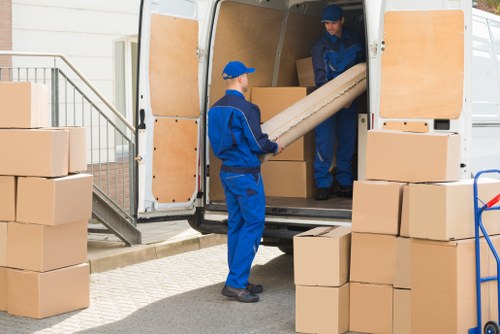Professional removal team loading household items in Edgware