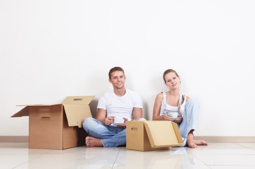 Packed office equipment and furniture ready for a commercial relocation