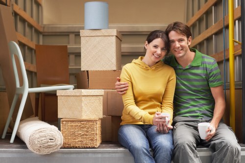 Careful furniture handling during a local house move in Edgware