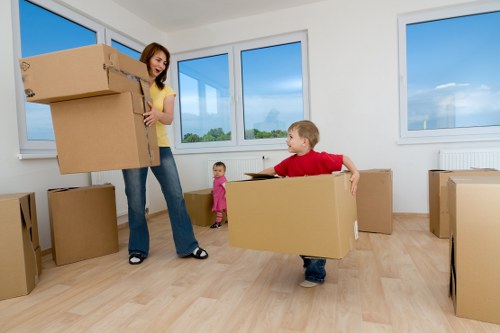 Loading furniture into a van for a move in North West London