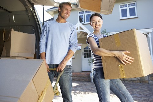 Packed household boxes and furniture ready for relocation