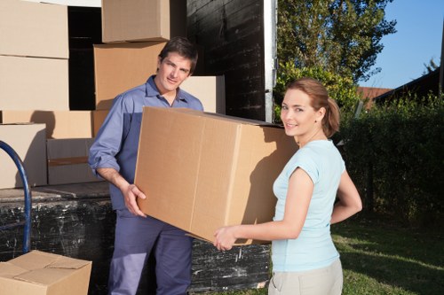 Removal van loading outside a typical Edgware property